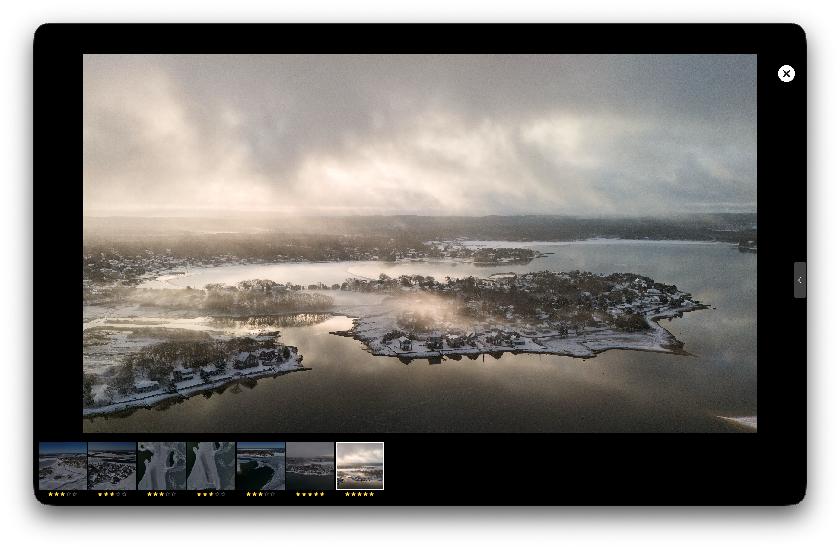 The grid filtered to 5-star photos showing two results with the inspector open
